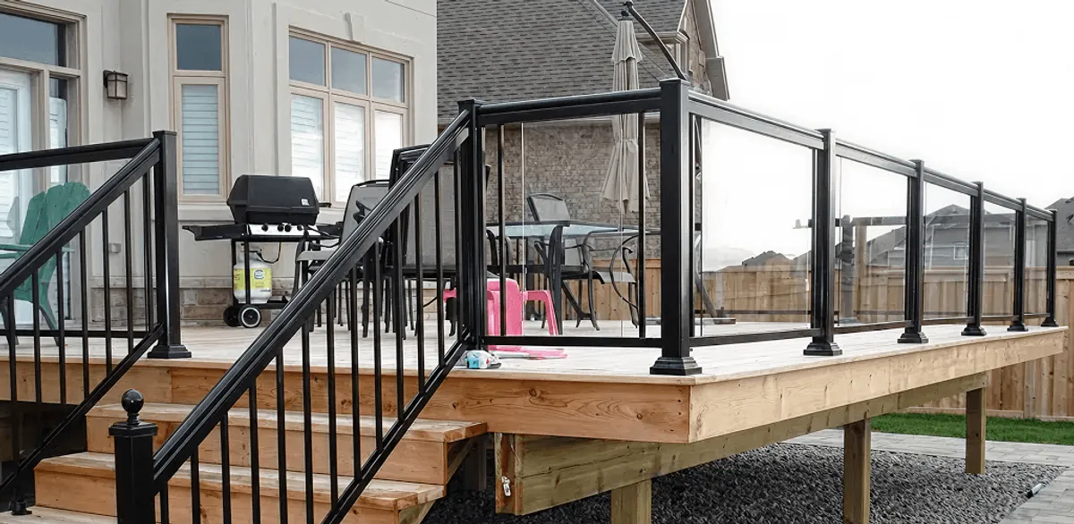 Handrail installation on a deck staircase for safety and code compliance in Wilmington, NC